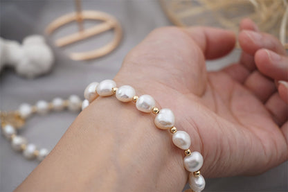 PULSERA DE PERLAS CON APLIQUES DE ORO 18K